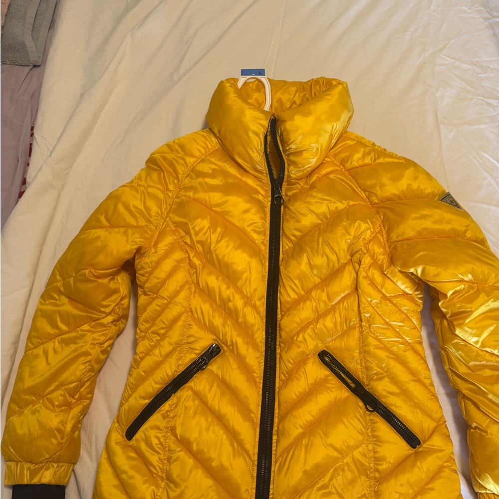 Bright yellow puffy jacket